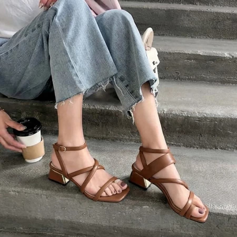 Women's tan strappy block-heel sandals with light-wash wide-leg jeans
