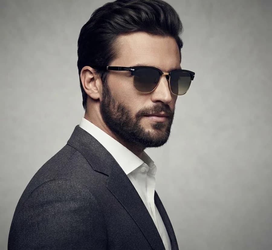 Men's browline clubmaster sunglasses with a charcoal suit and white shirt